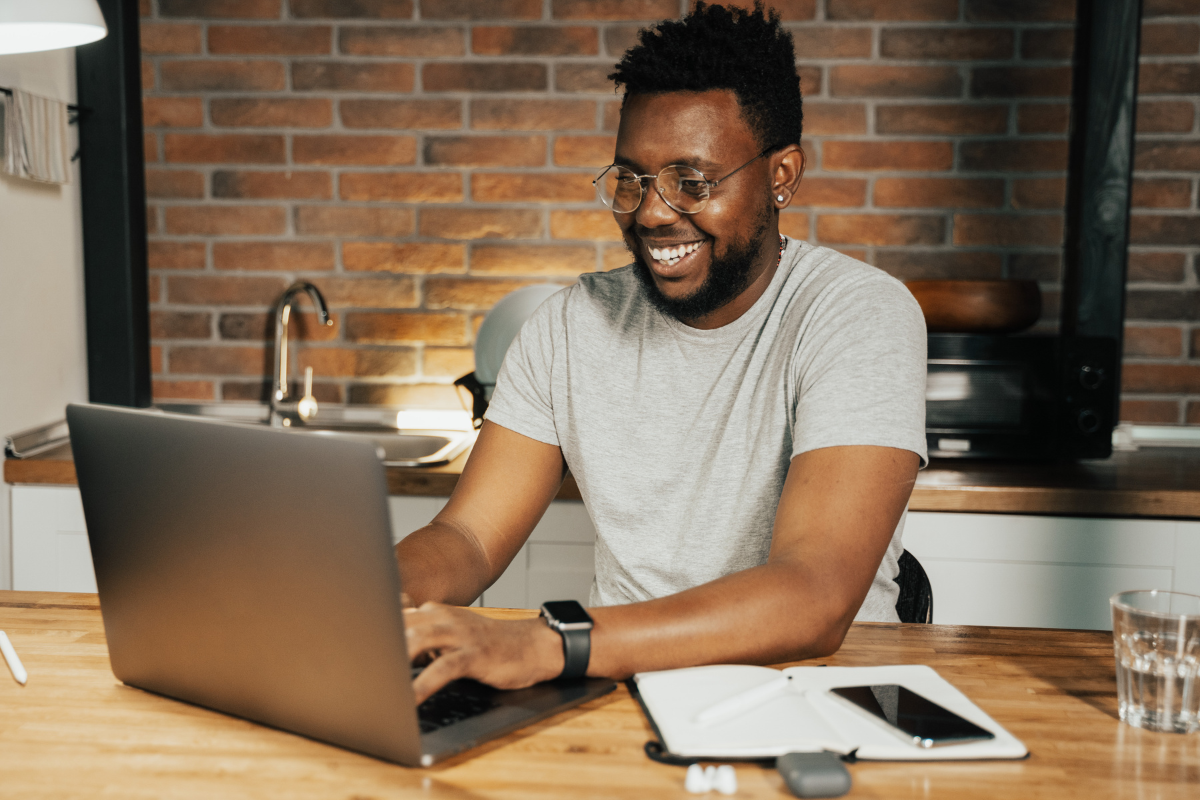 Person applying for a loan online on a laptop.