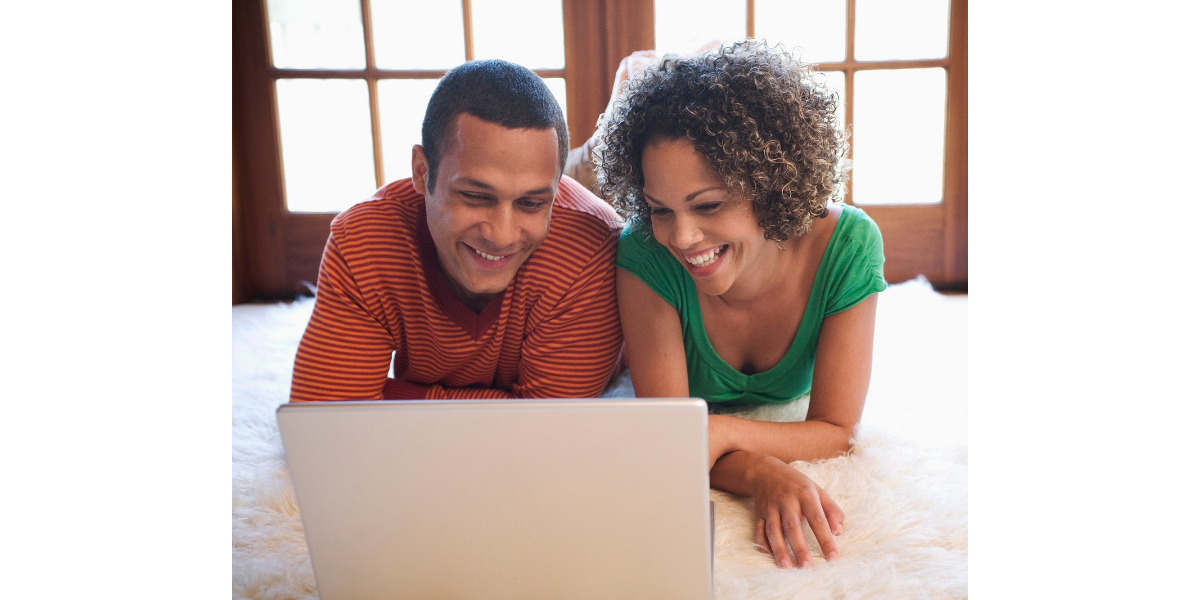 Couple applying for a personal loan online using a simple and secure application process.